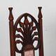 English armchair attributed to J.S. Henry, late 19th century.