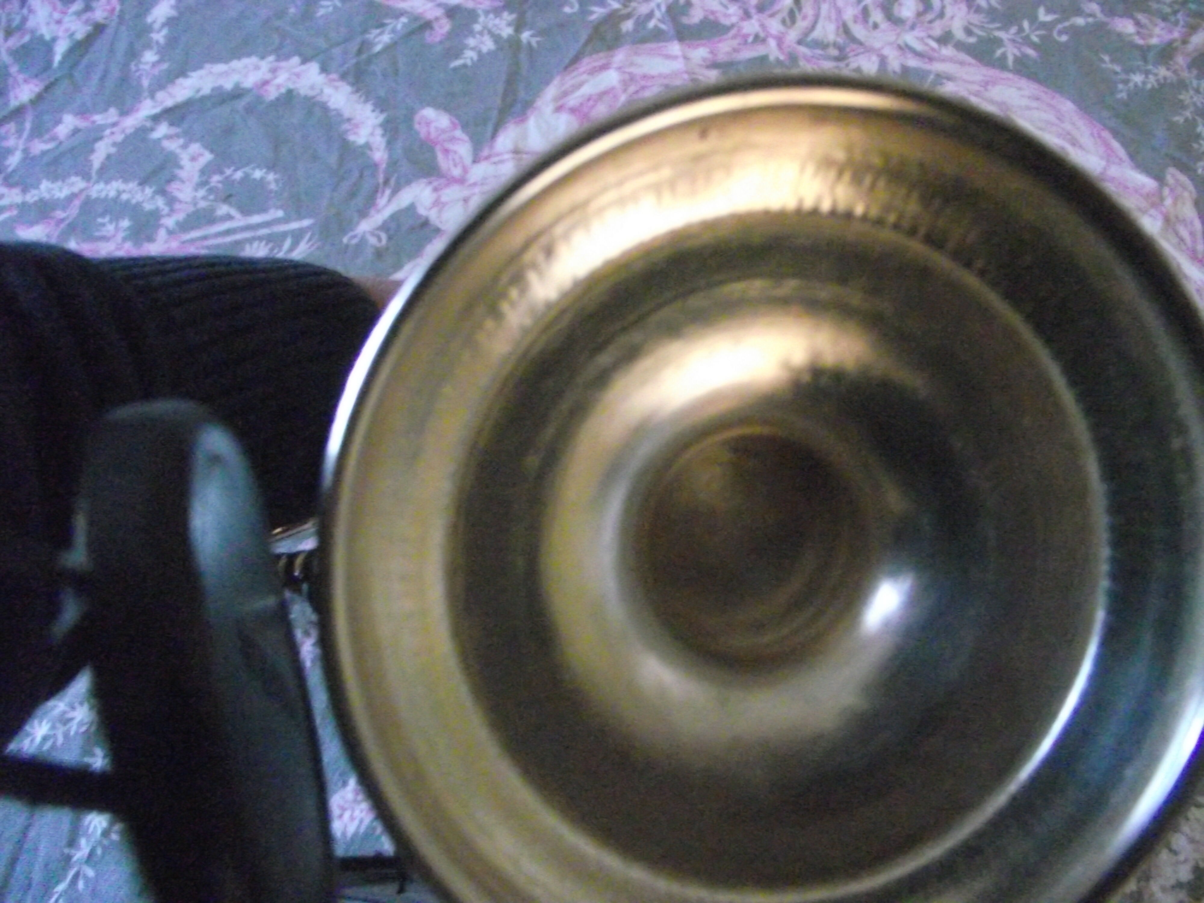 Empire-style silver metal teapot.