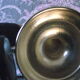 Empire-style silver metal teapot.