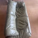 Two-seater Maralunga sofa in olive green leather.
