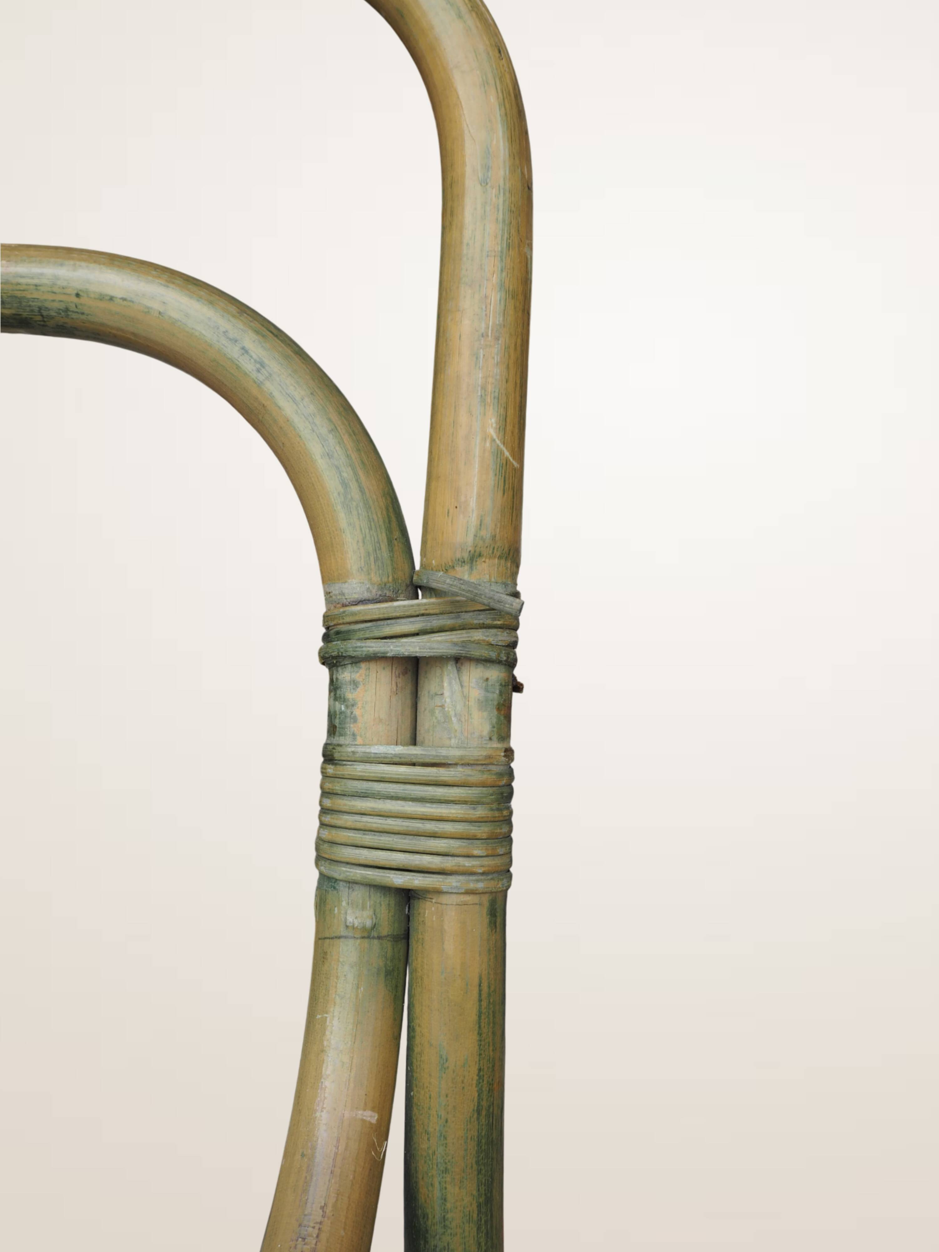 Pair of curved bamboo armchairs