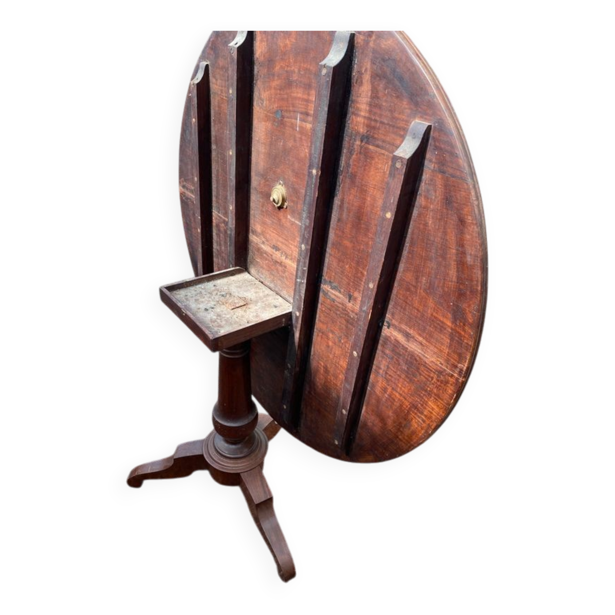 Old and large round winegrower's table made of wood.