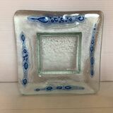 Blue glass paste pocket emptier