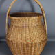 Large basket or basket in vintage rattan 60/70s. Very nice clean state.