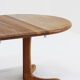 Table à manger ronde extensible vintage en teck massif des années 1960