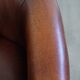 Fauteuil club en cuir de mouton