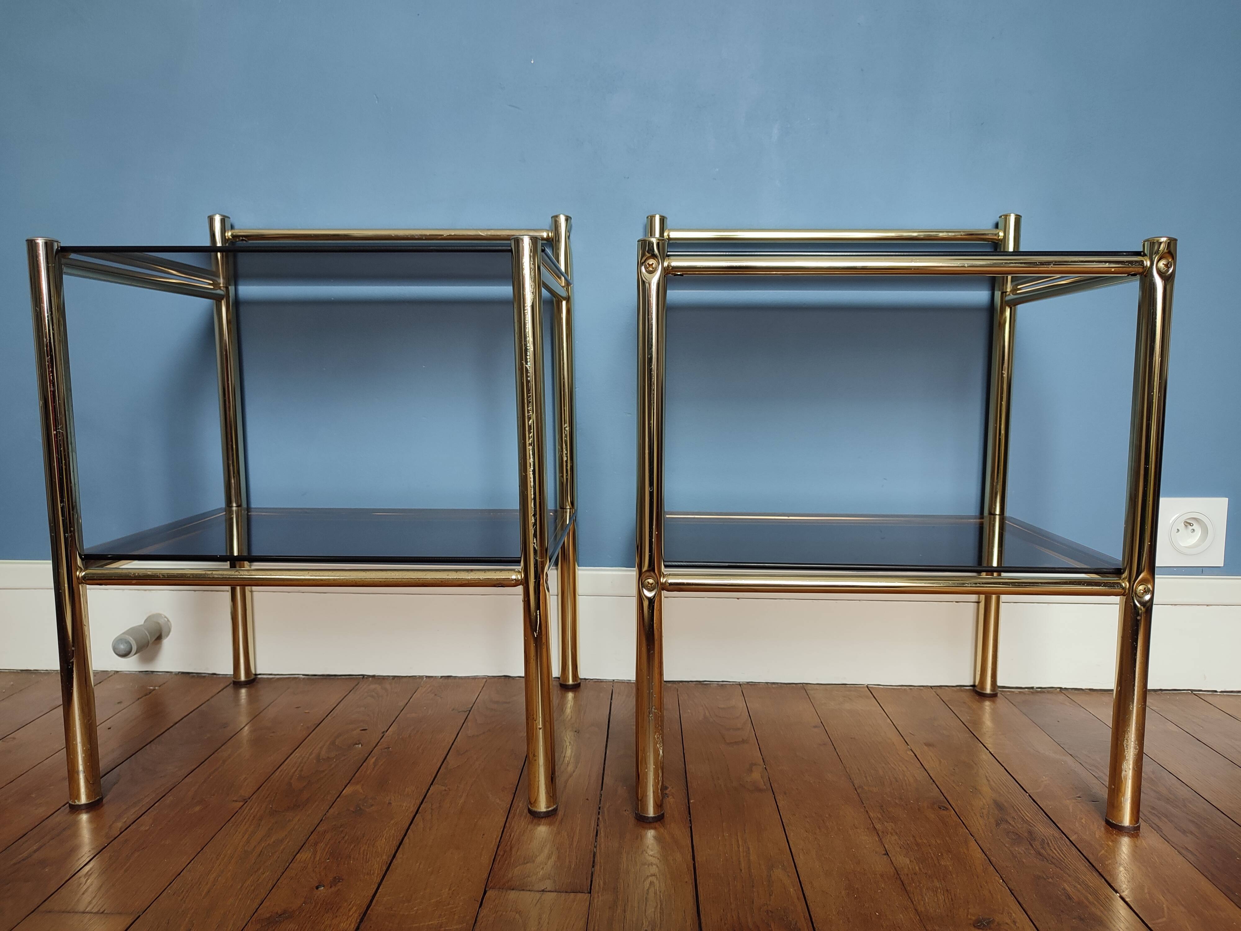 Pair of bedside tables, end of sofas in brass and vintage smoked glass