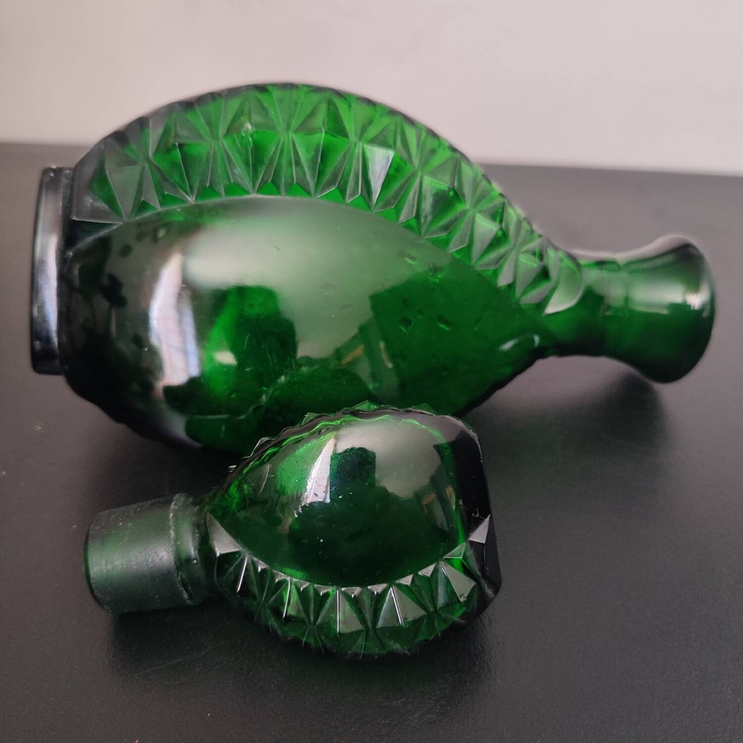 Vintage green carafe in chiseled glass