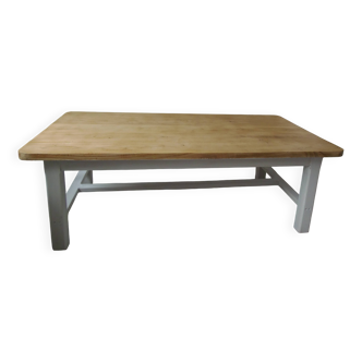 Coffee table made from a vintage farmhouse table in solid wood.