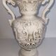 Vintage Italian white ceramic vase with raised floral decoration.
