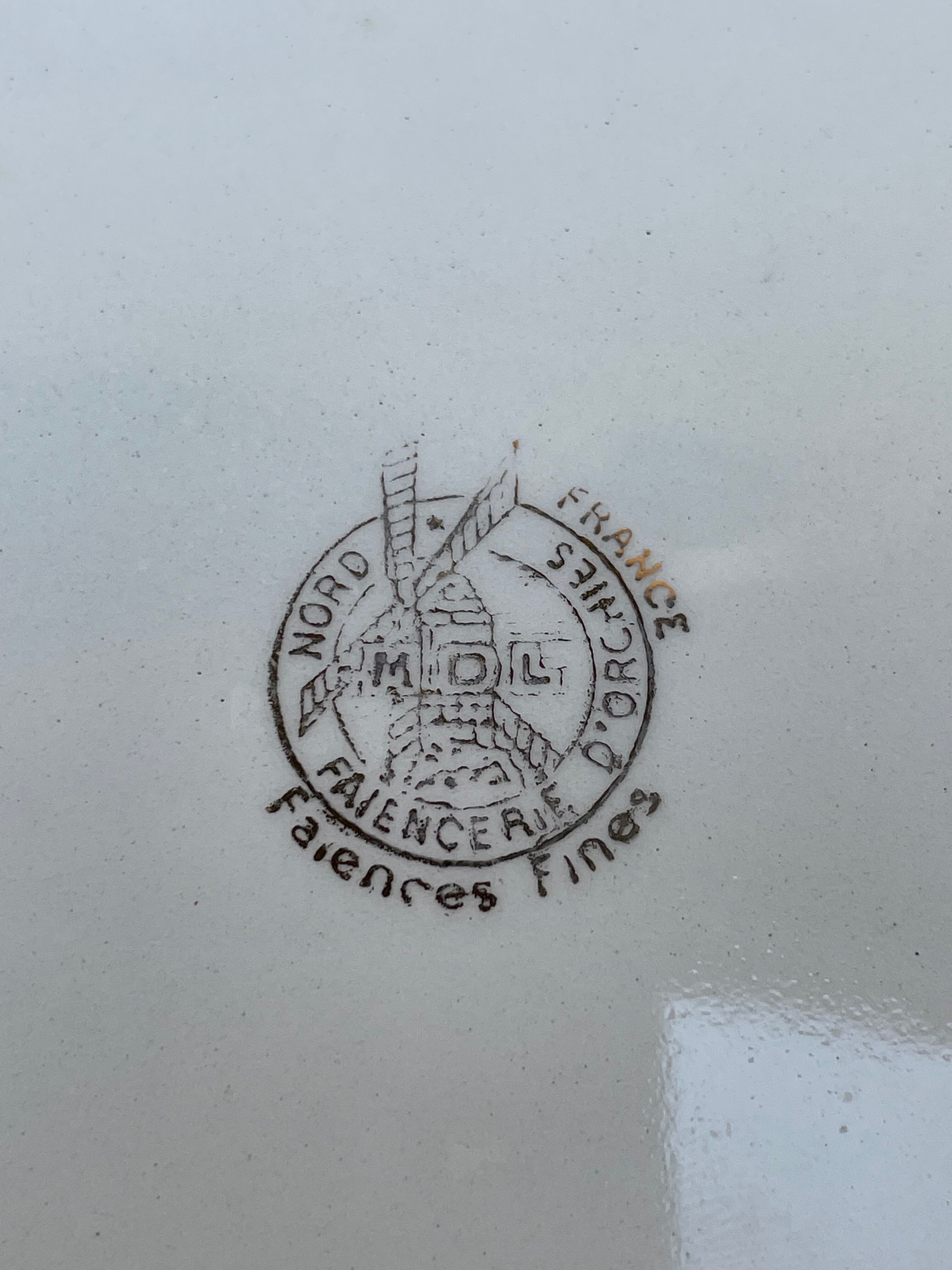 Set of 4 plates with floral motif, golden border early twentieth century