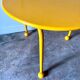 Yellow metal tripod coffee table by Tord Bjorklund for Ikea, circa 1980