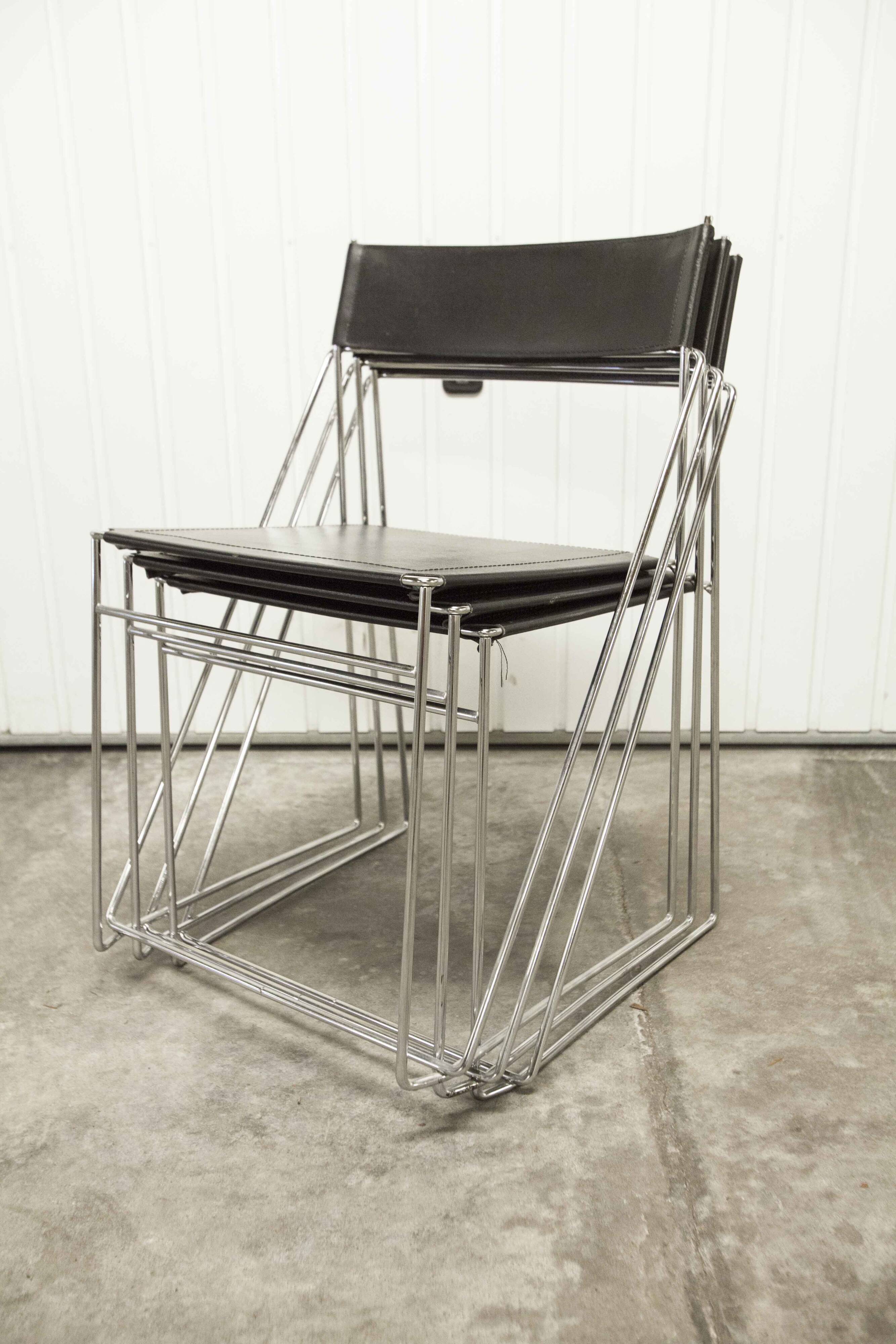 Set of 3 minimalist X line chairs by Niels Jorgen Haugesen.