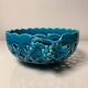 Turquoise cup woven by Émile Tessier in Malicorne.