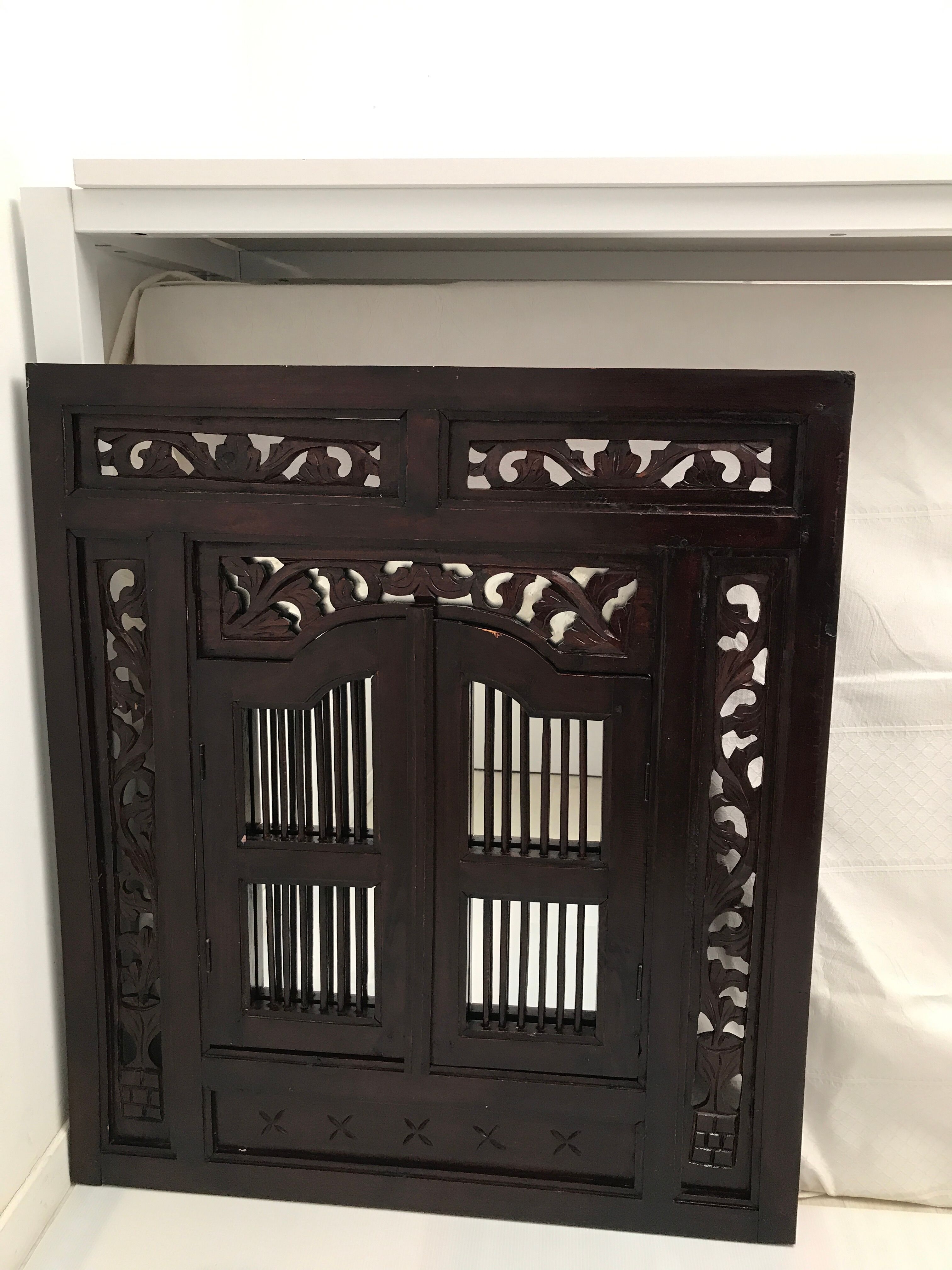 Vintage shuttered Indonesian mirror