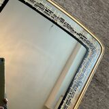 Asymmetrical free-form mirror from the 1970s