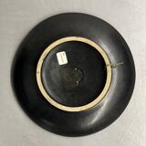 Wall plate by Pol Chambost with leaf pattern.