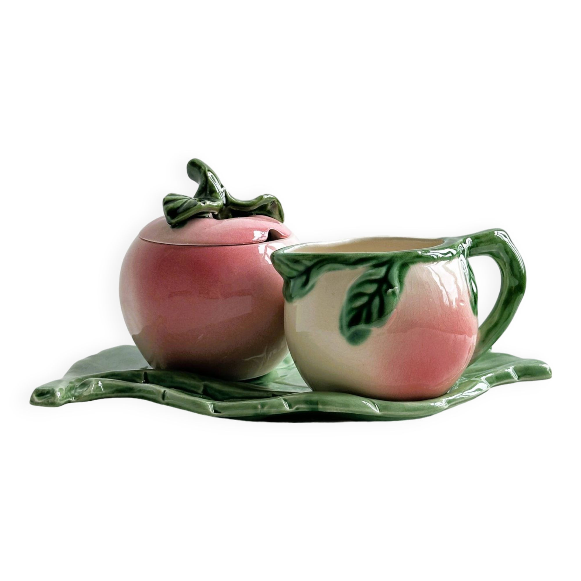 Saucière, sucrier et support en barbotine pêche rose.