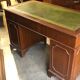 English pedestal desk with green leather top