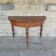 Demi-lune console table