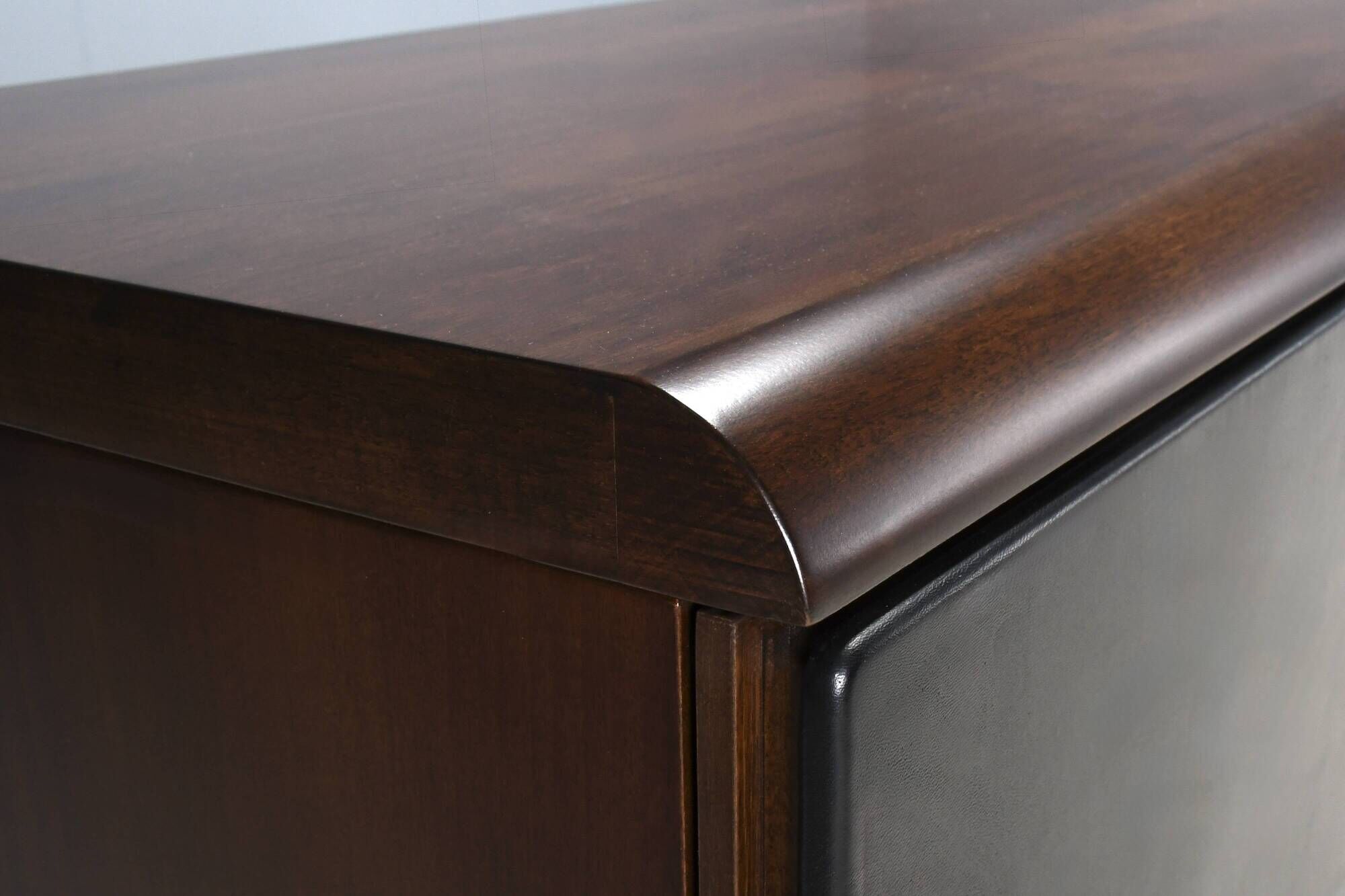 Walnut, metal and leather buffet by Hans von Klier “Il Ponte” for Skipper, 1970s.