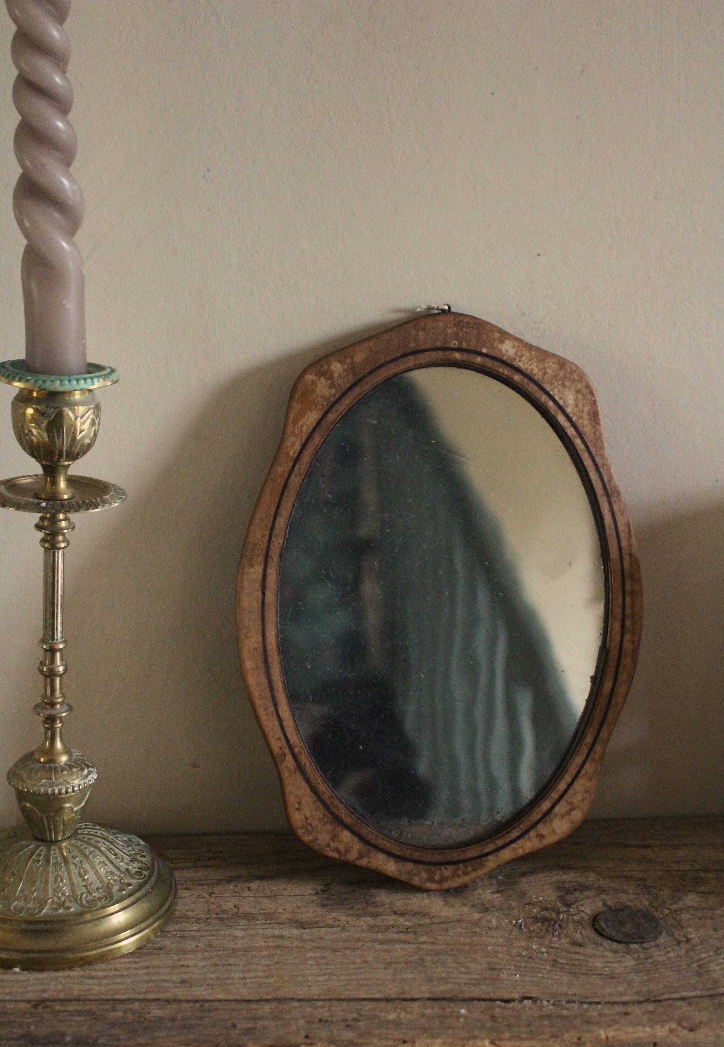 Small old wooden mirror
