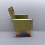 Vintage children's armchair in green skai