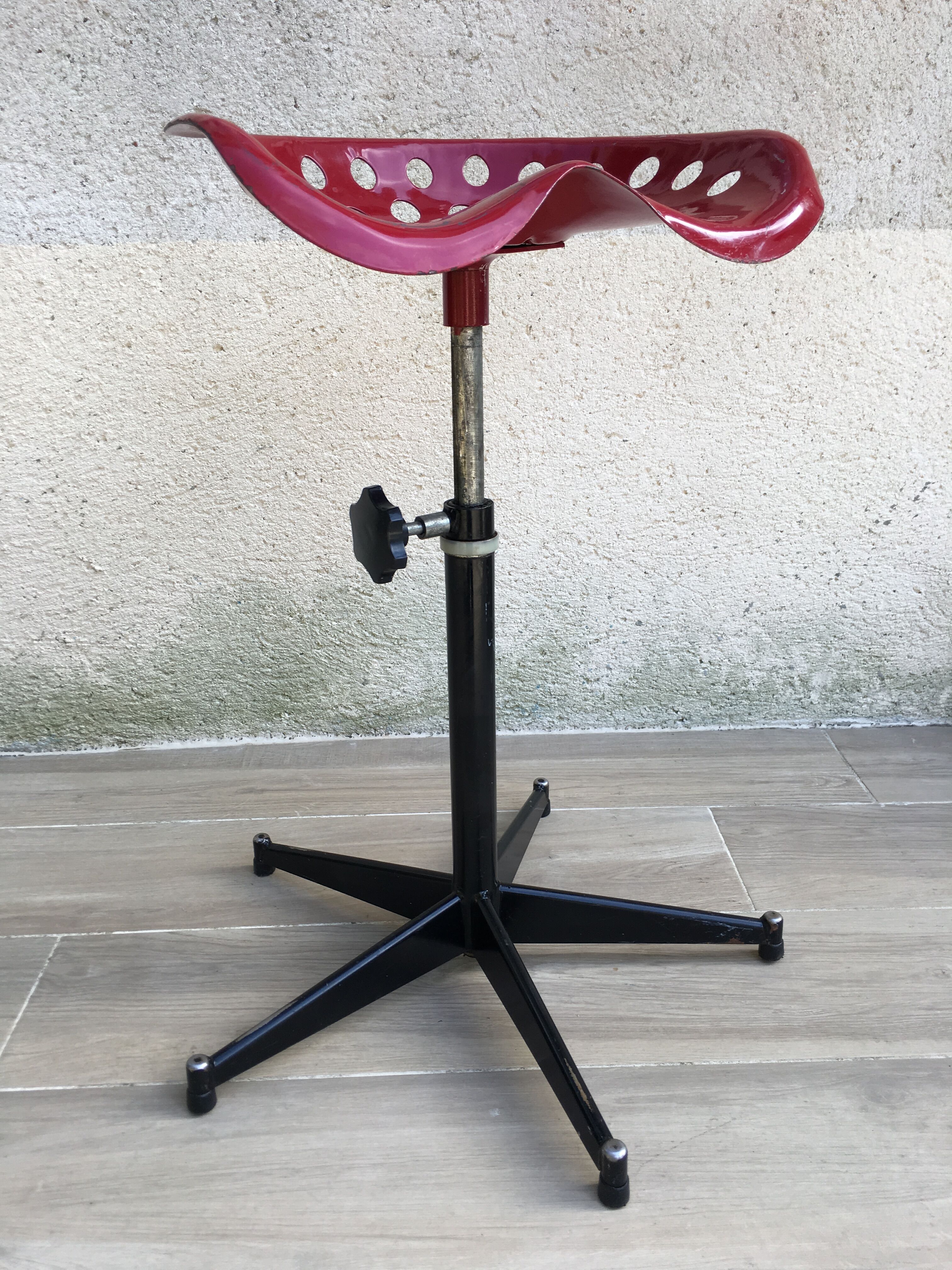 Vintage high stool sitting tractor