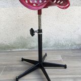 Vintage high stool sitting tractor