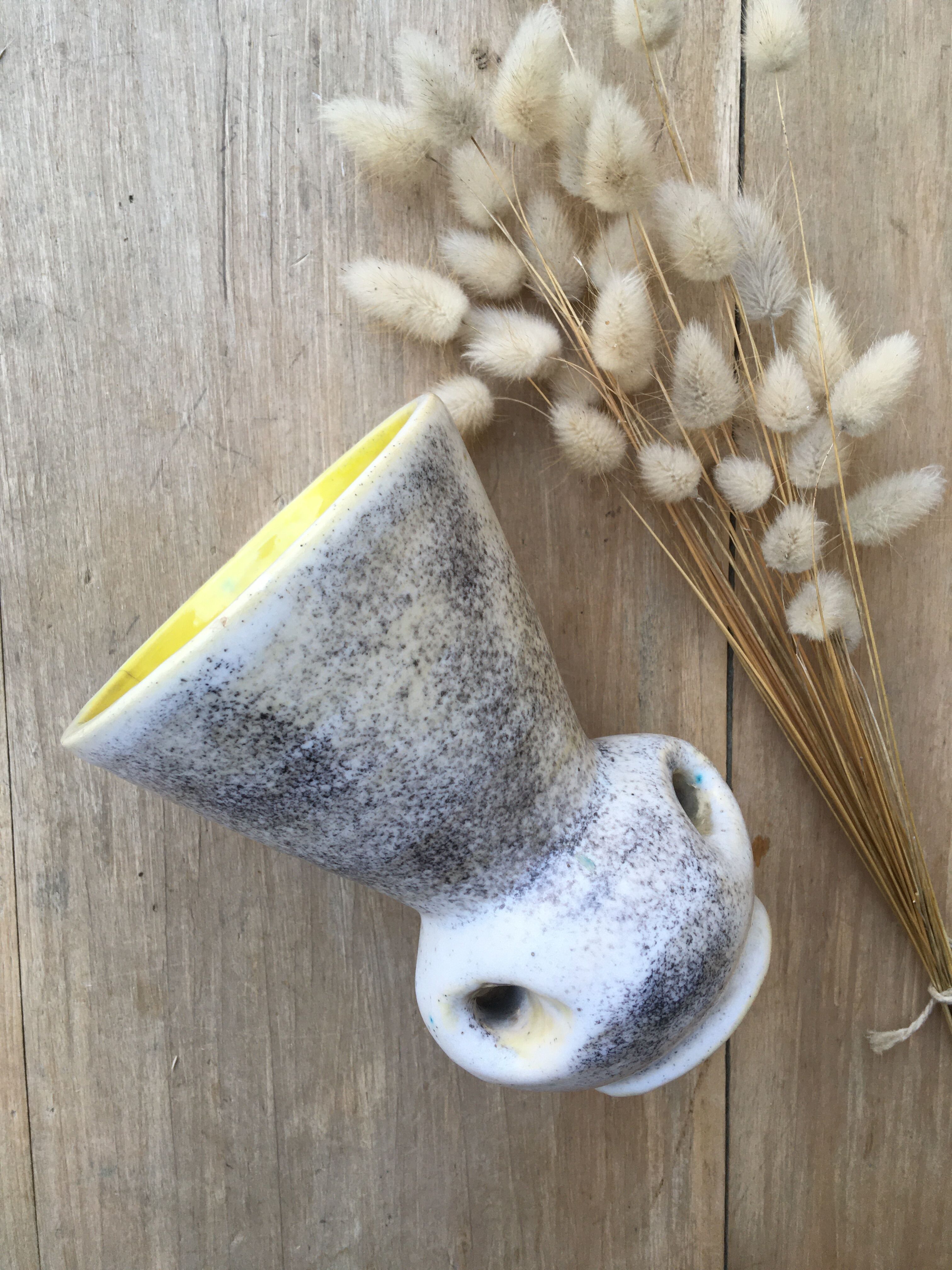 Yellow ceramic vase