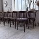 Set of 14 walnut bistro chairs.