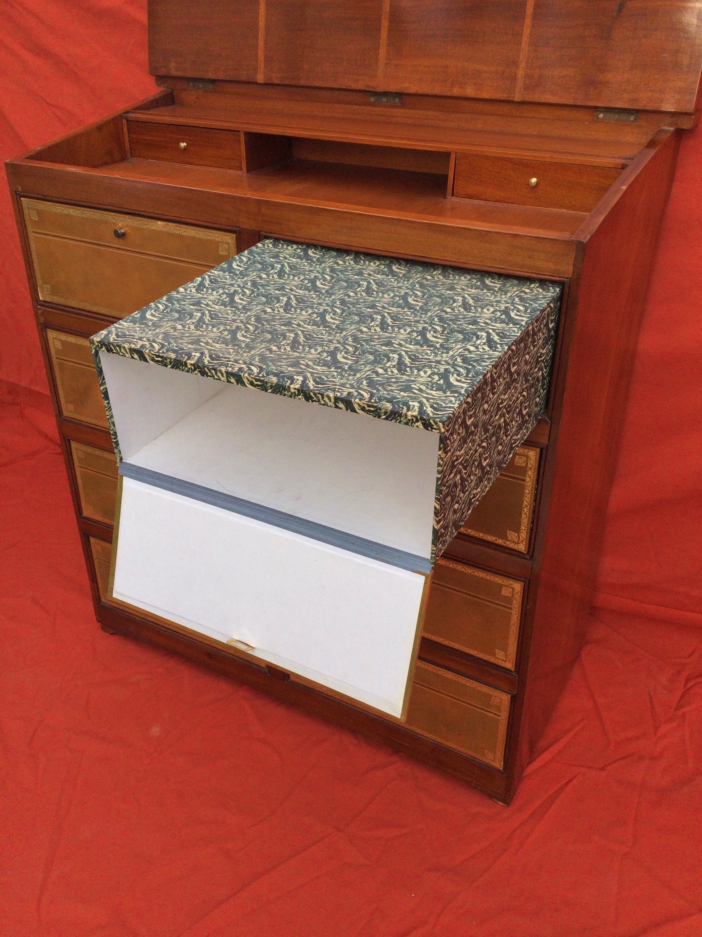 Cardboard maker forming mahogany writing