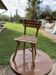 Small brown wooden accent chair, Hungarian countryside, 1950s.