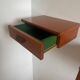 Vintage Scandinavian teak wall-mounted bedside tables.