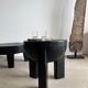 Black mango wood tripod side table with a semi-spherical top, height: 45 cm, diameter: 44 cm.