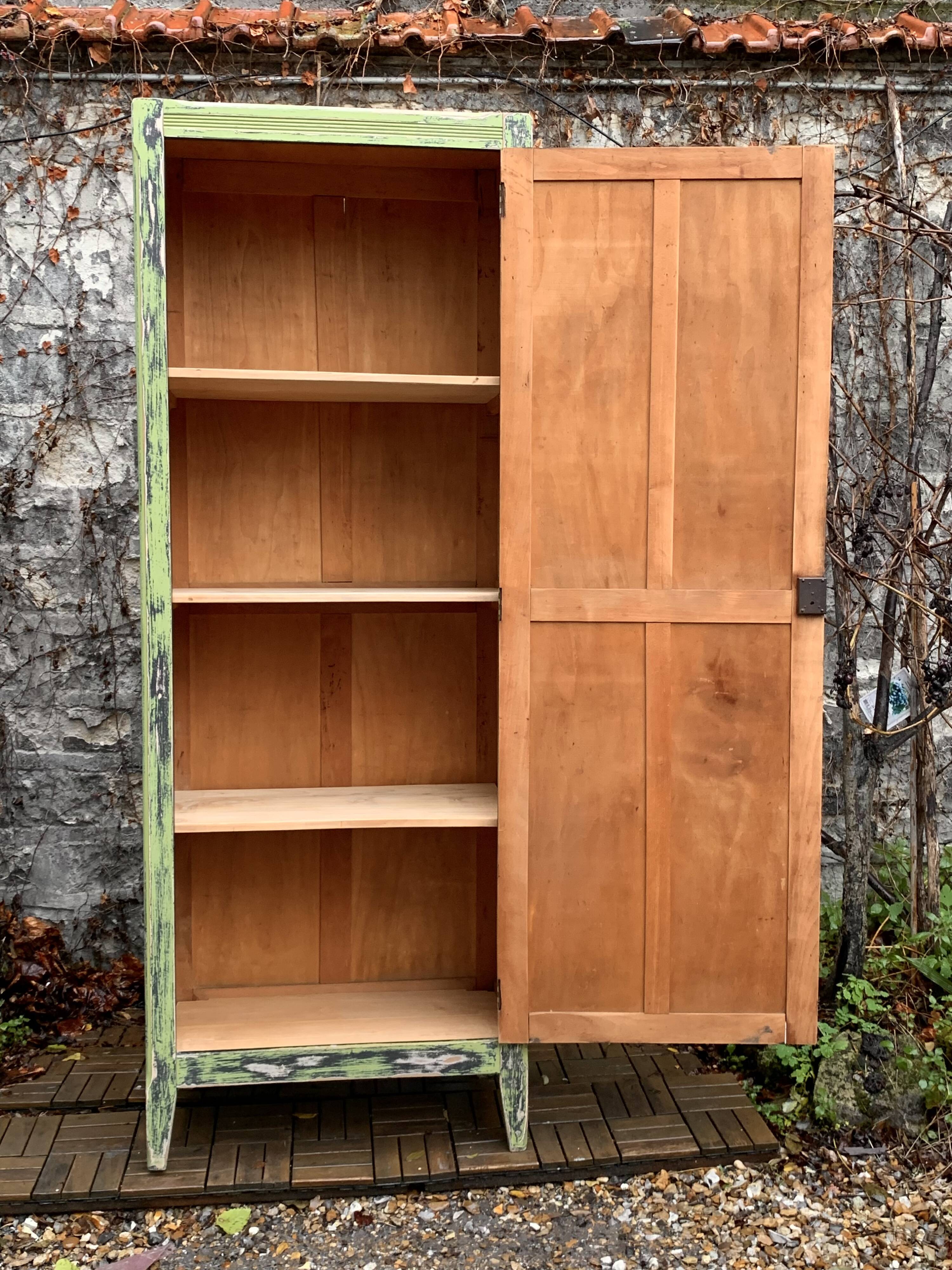 Antique Parisian bonnet wardrobe with khaki patina