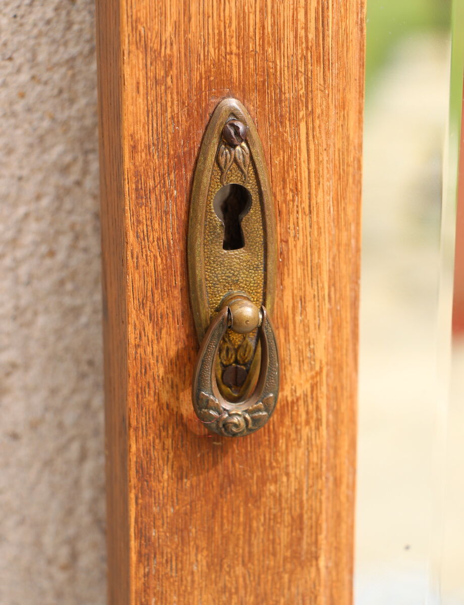 Beveled floor mirror on art deco frame