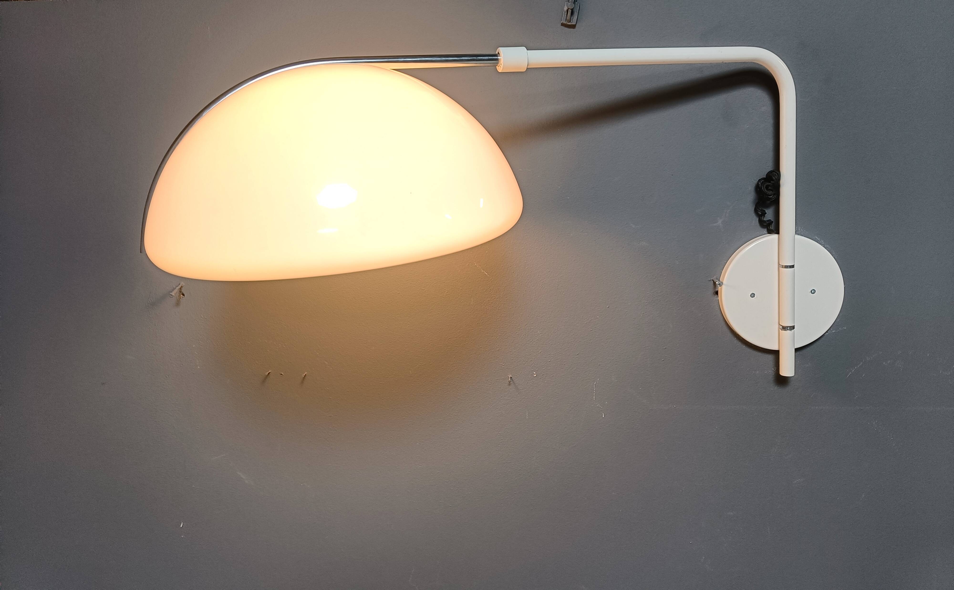 Vintage wall lamp by Luigi Massoni for Guzzini, 1970s