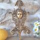 Antique brass coat hook