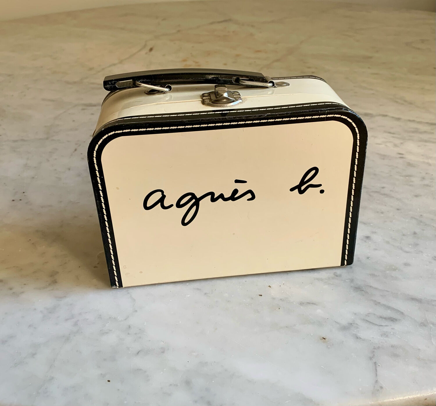 Advertising suitcase Agnès b child