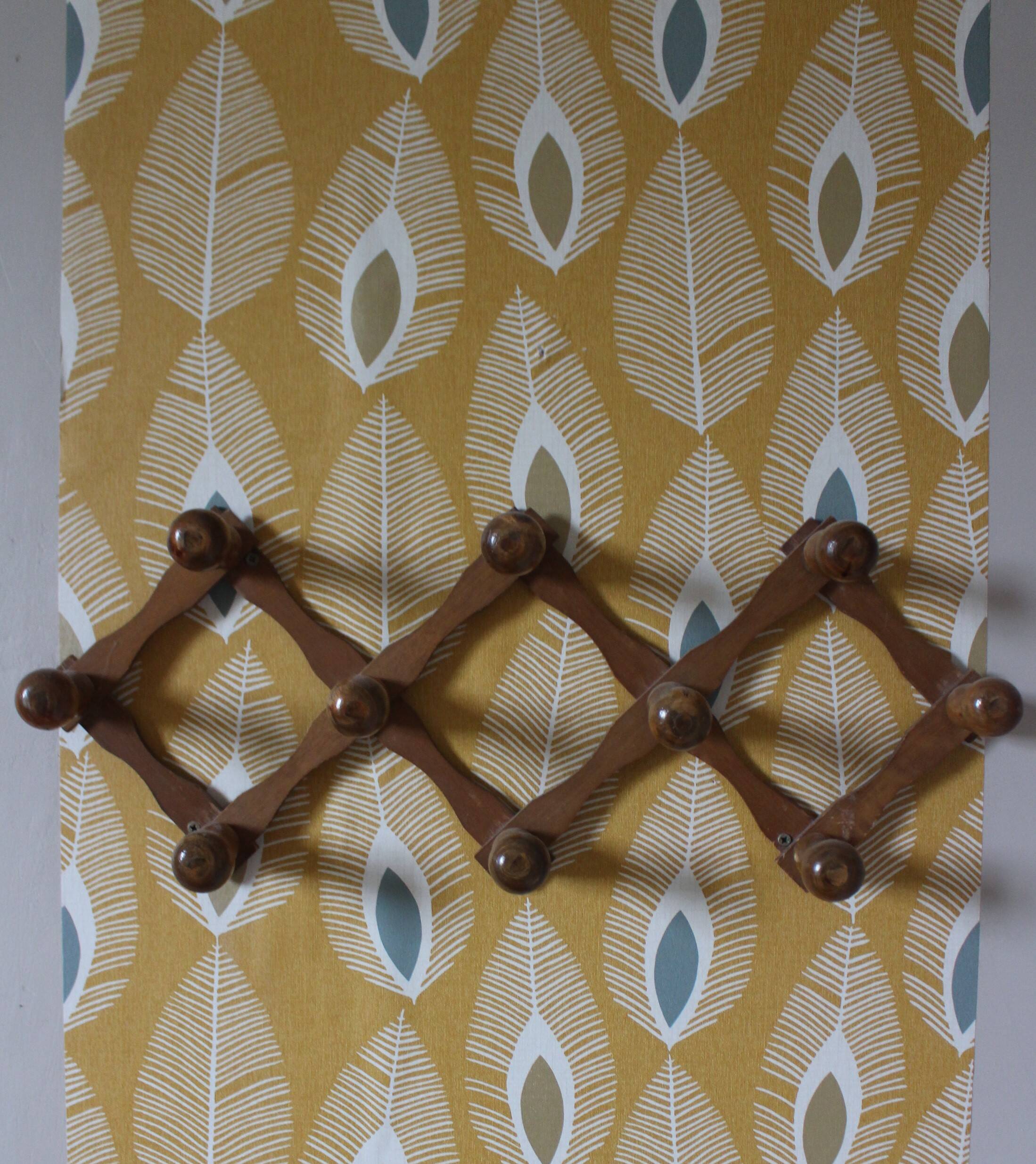 Vintage wooden ball accordion coat rack