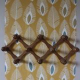 Vintage wooden ball accordion coat rack