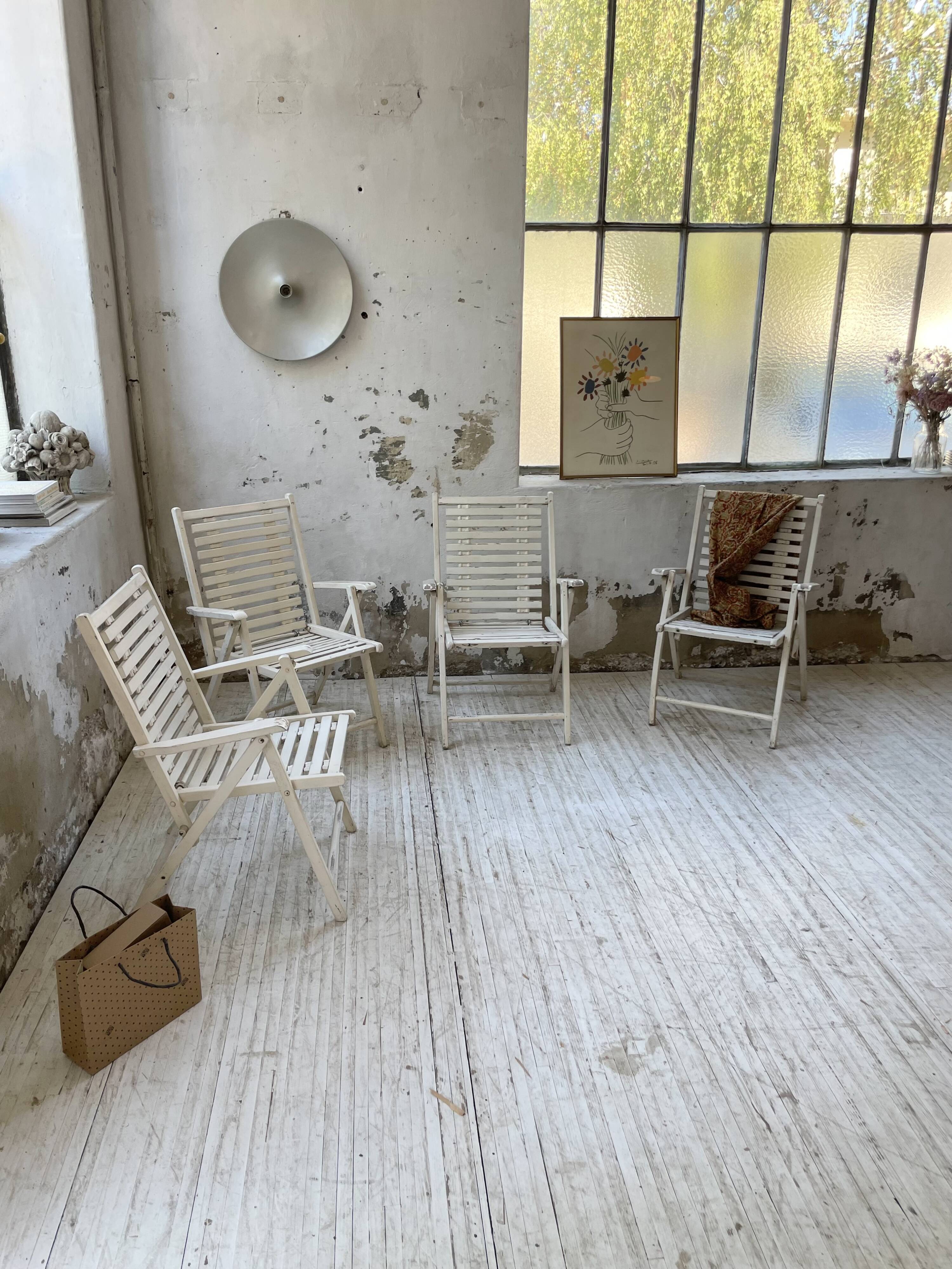 4 white wooden garden chairs