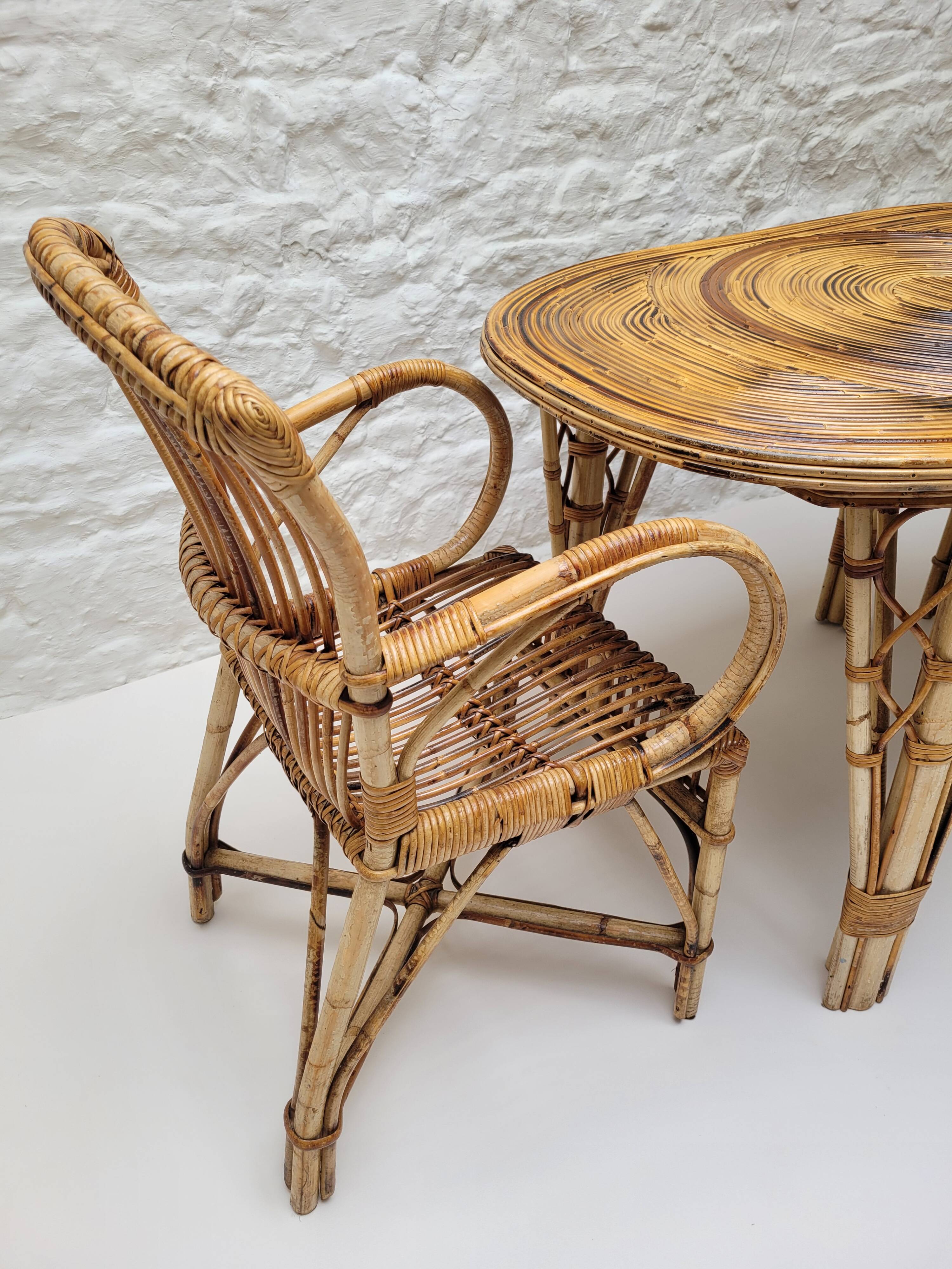 Vintage Audoux Minet bamboo, rattan, and smoked glass table duo.