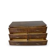 A vintage Italian chest of drawers, made of veneered walnut and solid wood,