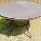 Garden table with wrought iron base