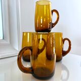 4 mugs/ mugs in vintage blown amber glass