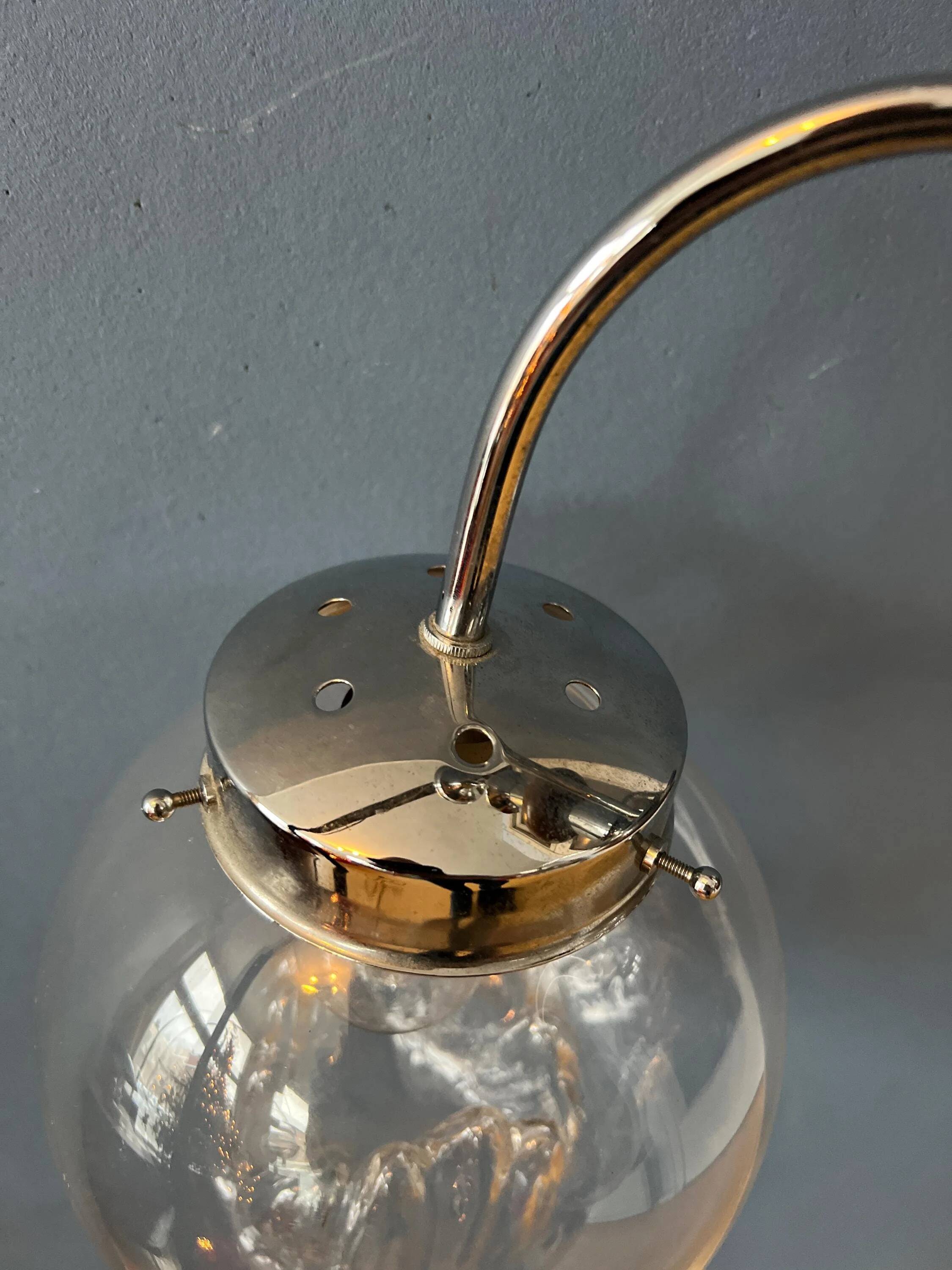 Vintage transparent glass chandelier from Murano with a chrome structure.