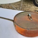 Lots of tinned copper kitchen utensils