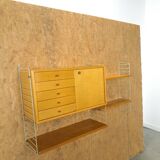 String modulair wandsysteem met kast en planken